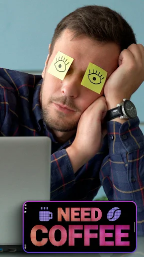 User displaying LED banner text NEED COFFEE in LED Scroller app on phone held beside laptop computer