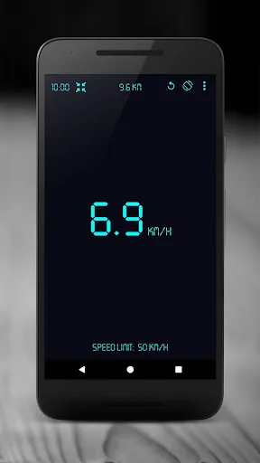 GPS Speedometer showing 6.9 km/h in cyan digital display with 50 km/h speed limit indicator on dark screen