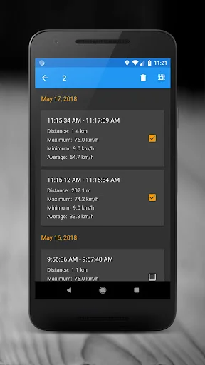 Trip History with selection mode enabled showing saved journeys with distance and speed data from May 2018