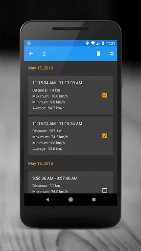 Trip History with selection mode enabled showing saved journeys with distance and speed data from May 2018
