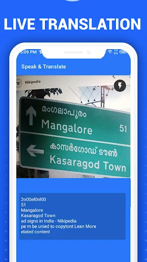 Live translation feature showing real-time camera translation of road sign from Malayalam to English